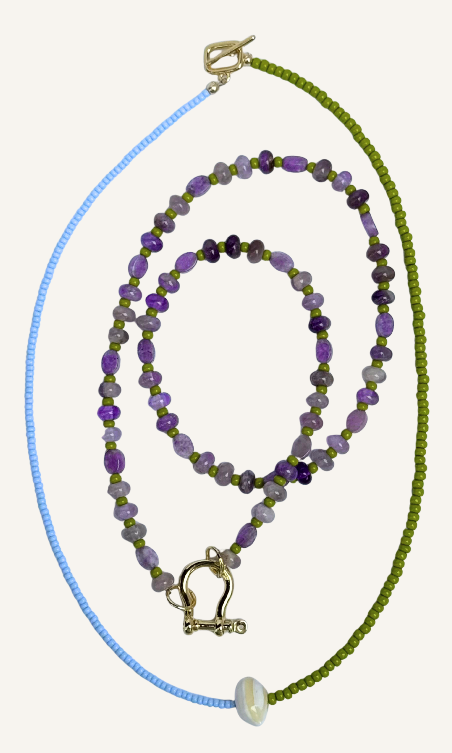 Dainty green and blue color block necklace with Mother of Pearl, gold filled findings, and a toggle closure and purple lepidolite and amethyst necklace with green spacer beads, gold filled findings, and a horsebit carabiner