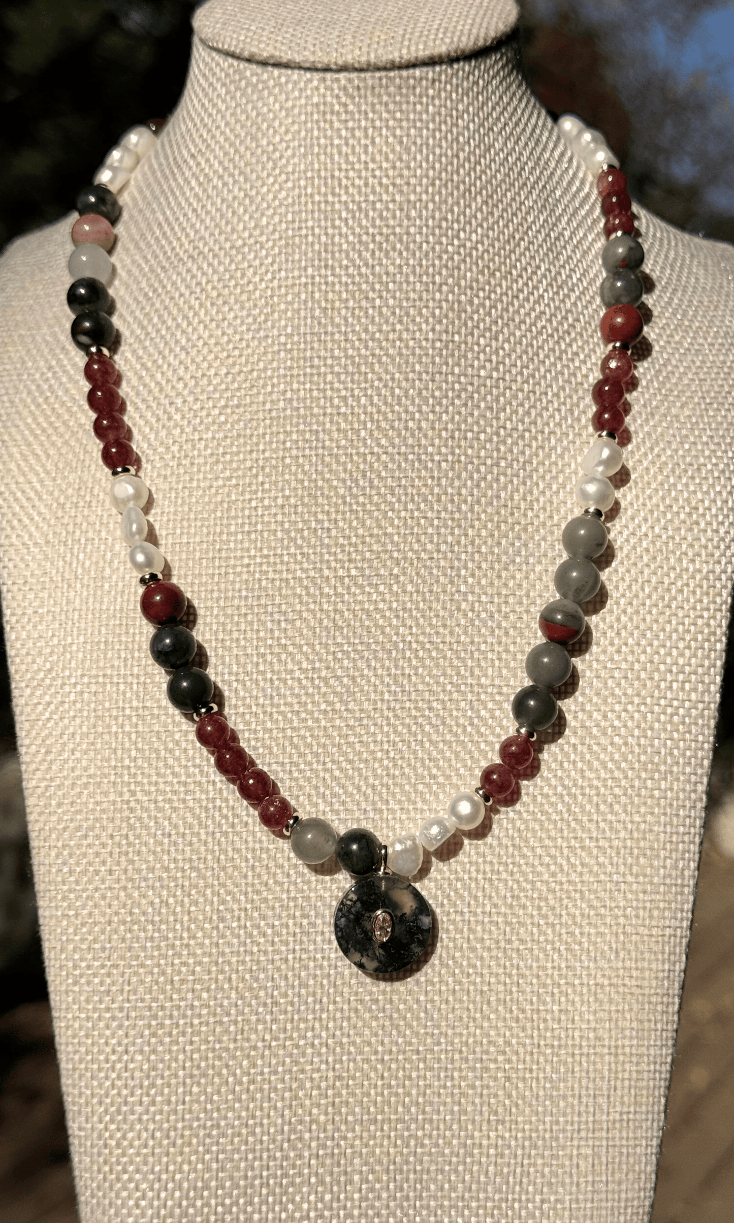 African Bloodstone, Strawberry Quartz, and Freshwater Pearl necklace with a Green Agate and Pink Cubic Zirconia charm, gold filled findings, and a toggle clasp