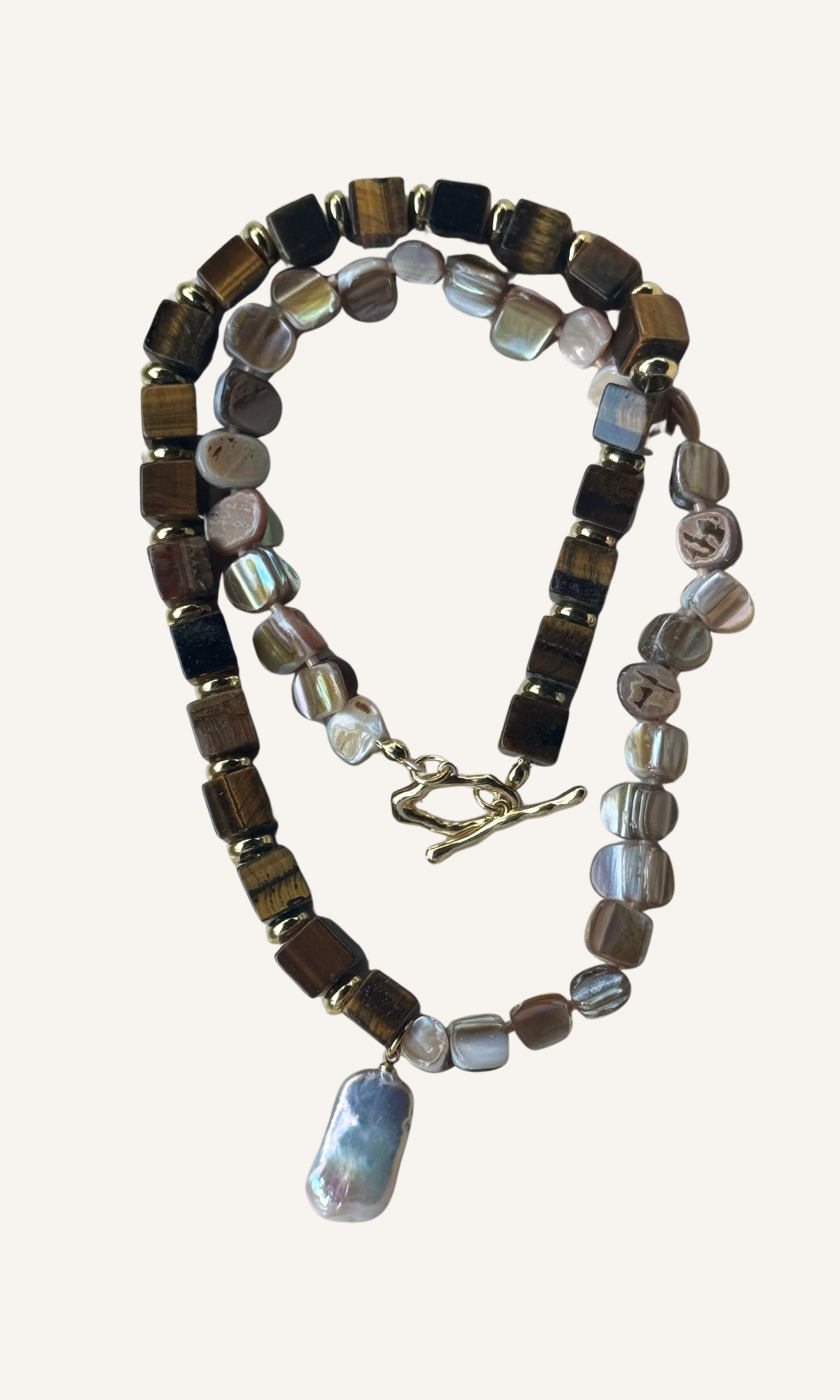Brown Tiger's Eye and natural brown Mother of Pearl necklace with Freshwater Pearl charm, gold filled findings, and a toggle closure