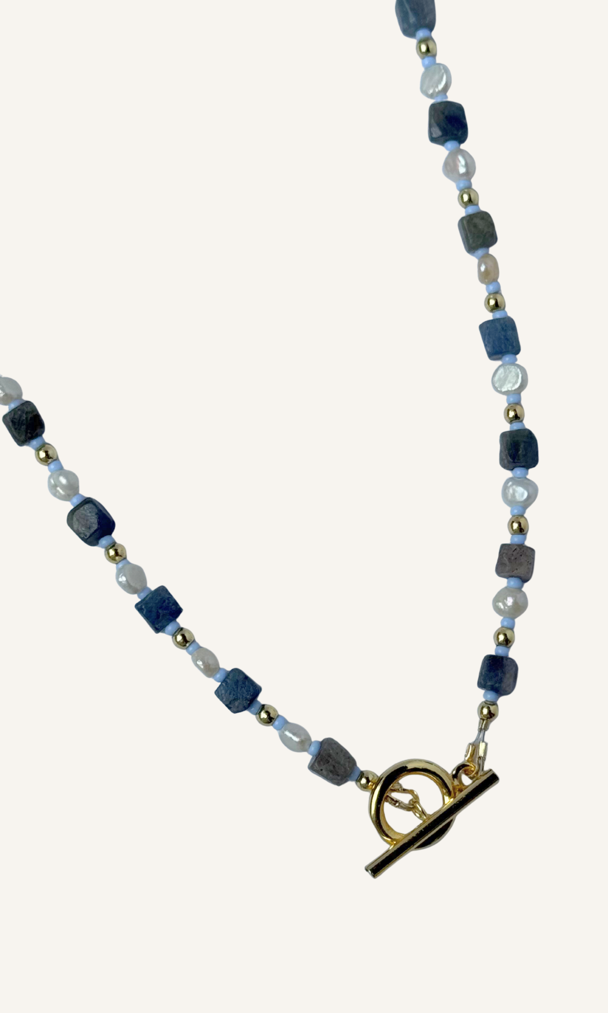 Cubed Sapphire and tiny Freshwater Pearl necklace with light blue and gold spacer beads, gold filled findings, and a toggle closure