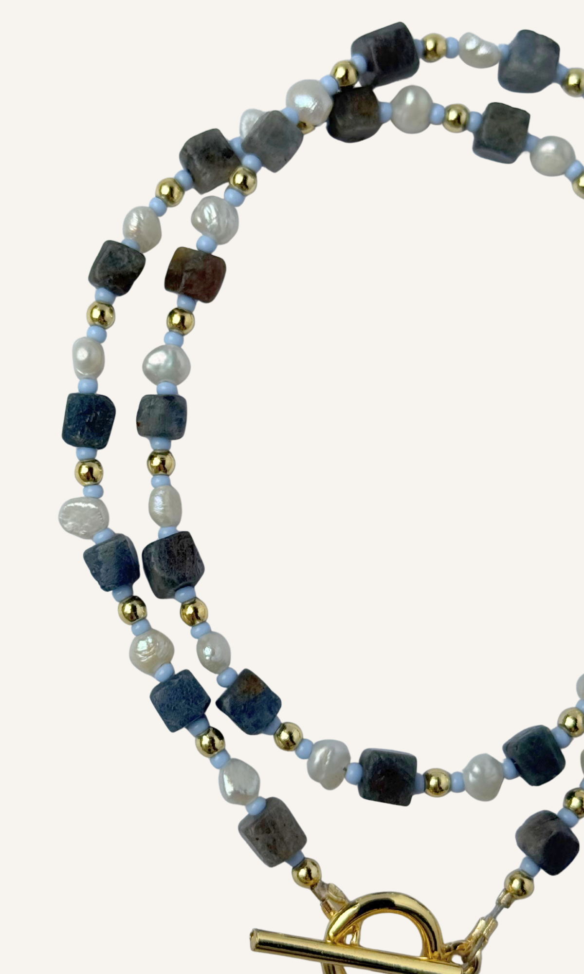 Cubed Sapphire and tiny Freshwater Pearl necklace with light blue and gold spacer beads, gold filled findings, and a toggle closure