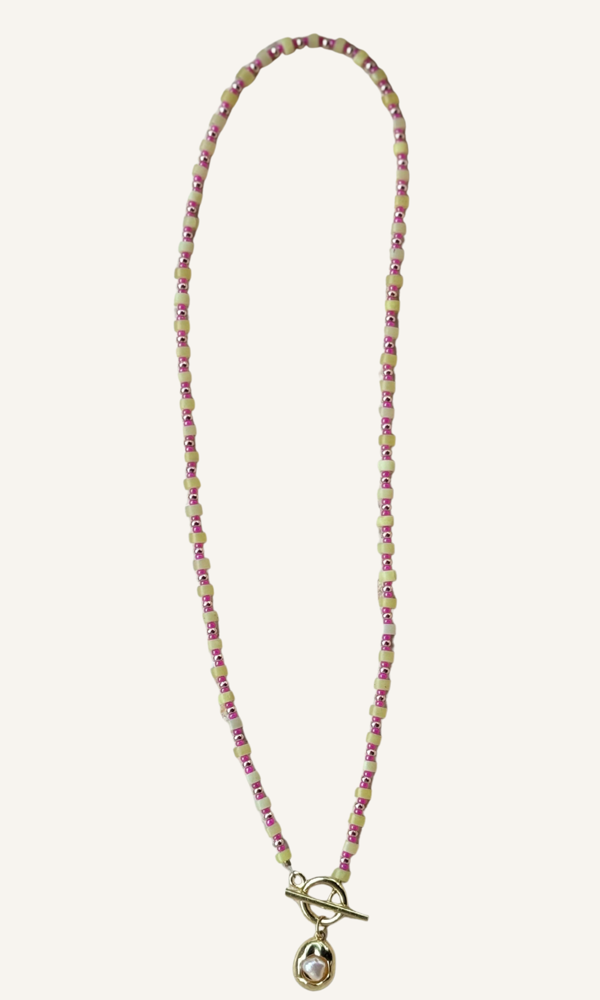 Dainty Lemon Jade necklace with hot pink spacer beads, Freshwater Pearl charm, gold filled findings, and a toggle closure