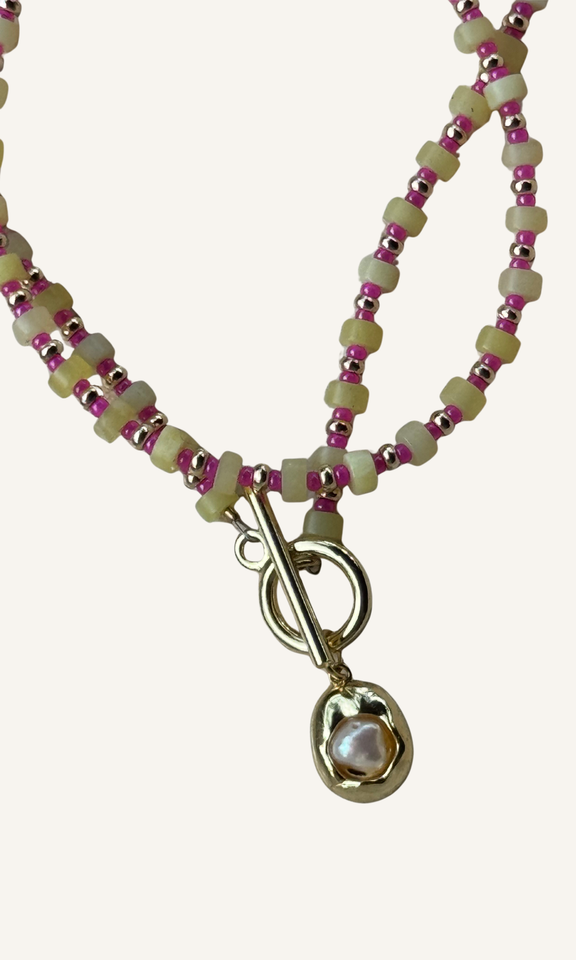 Dainty Lemon Jade necklace with hot pink spacer beads, Freshwater Pearl charm, gold filled findings, and a toggle closure