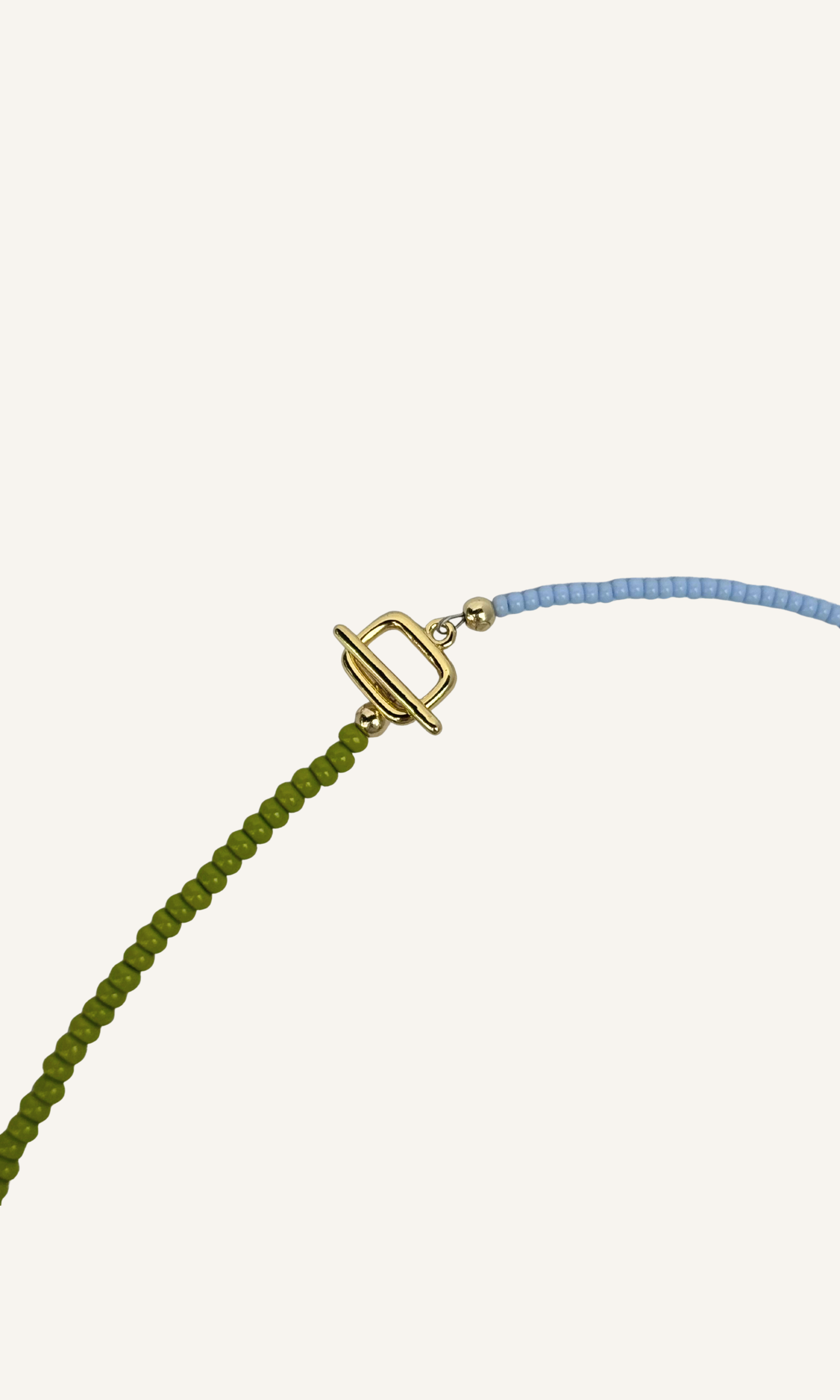 Dainty green and blue color block necklace with Mother of Pearl, gold filled findings, and a toggle closure