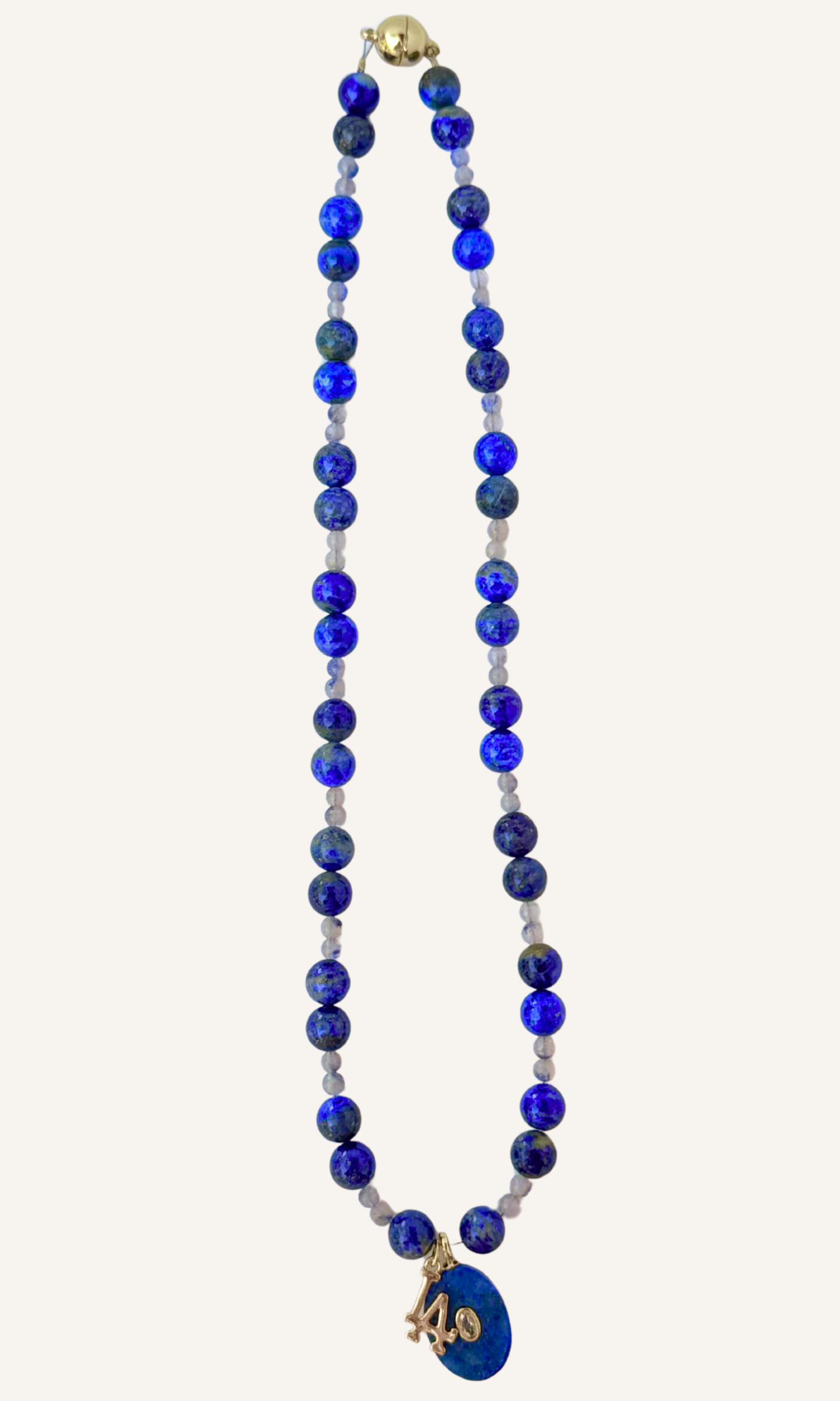 LA Dodgers inspired Lapis and Dumortiarite in Quartz necklace with Lapis and LA charms and a magnetic clasp. All metal is gold filled