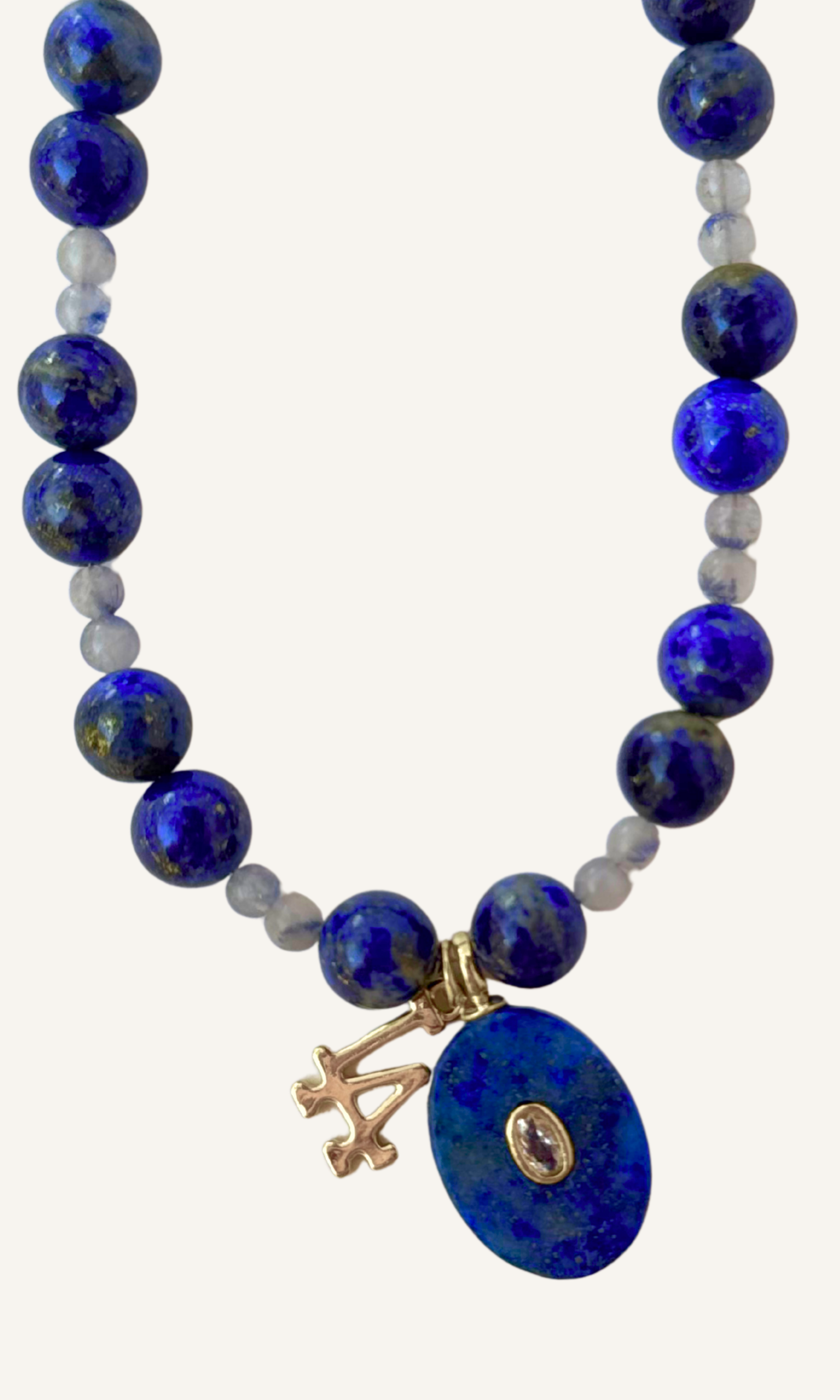LA Dodgers inspired Lapis and Dumortiarite in Quartz necklace with Lapis and LA charms and a magnetic clasp. All metal is gold filled