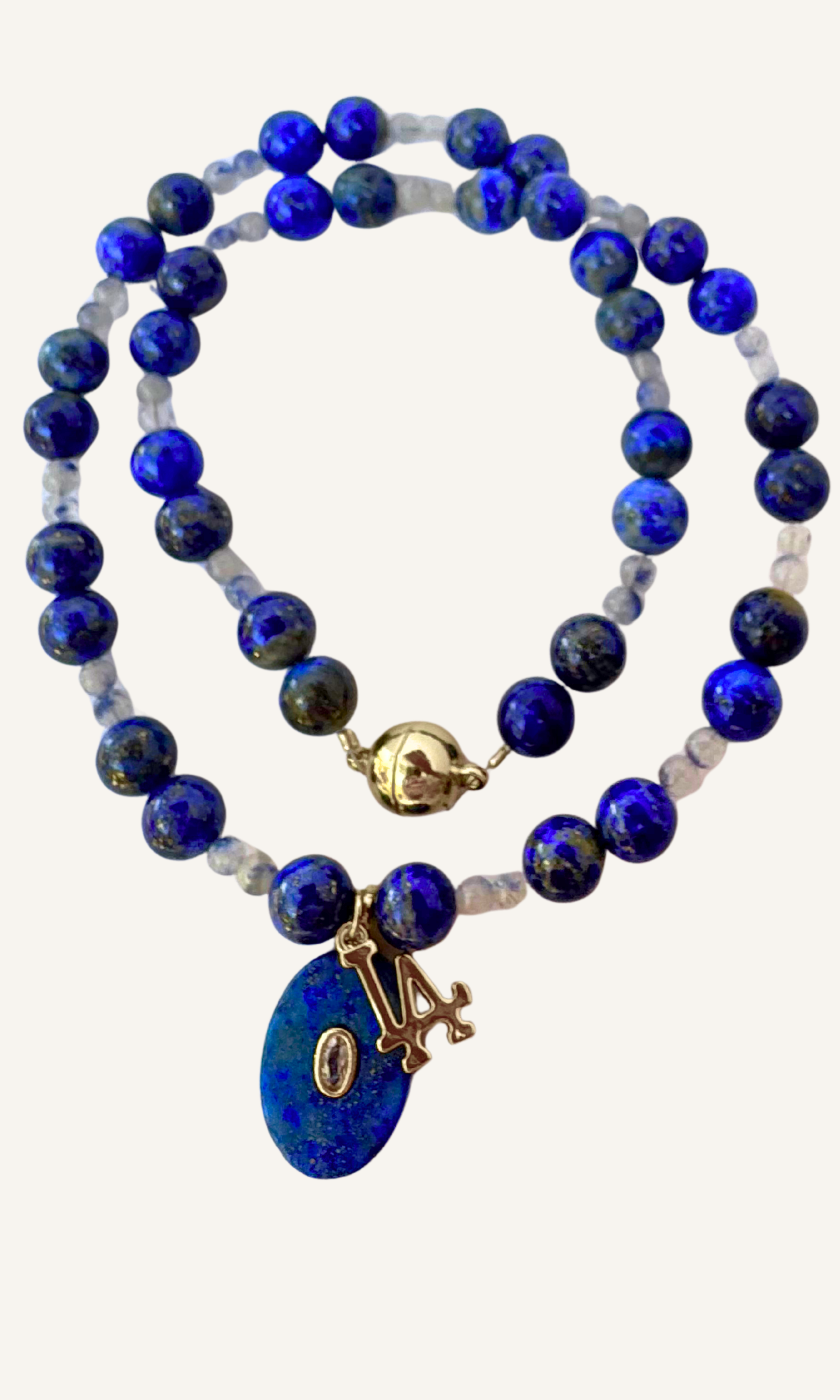 LA Dodgers inspired Lapis and Dumortiarite in Quartz necklace with Lapis and LA charms and a magnetic clasp. All metal is gold filled