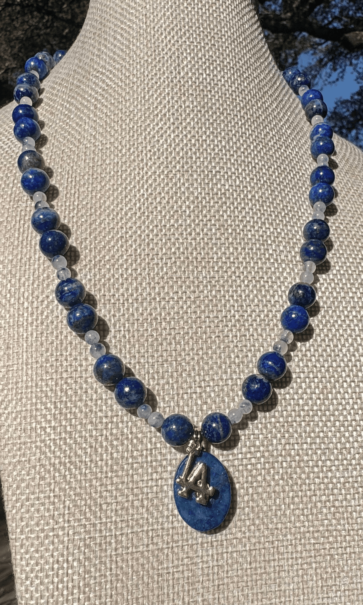 LA Dodgers inspired Lapis and Dumortiarite in Quartz necklace with Lapis and LA charms and a magnetic clasp. All metal is gold filled