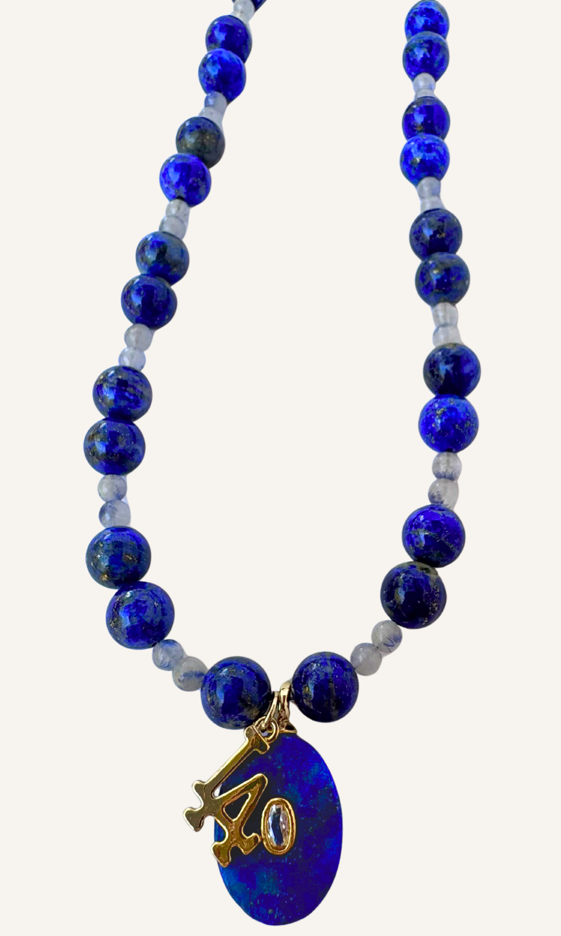 LA Dodgers inspired Lapis and Dumortiarite in Quartz necklace with Lapis and LA charms and a magnetic clasp. All metal is gold filled