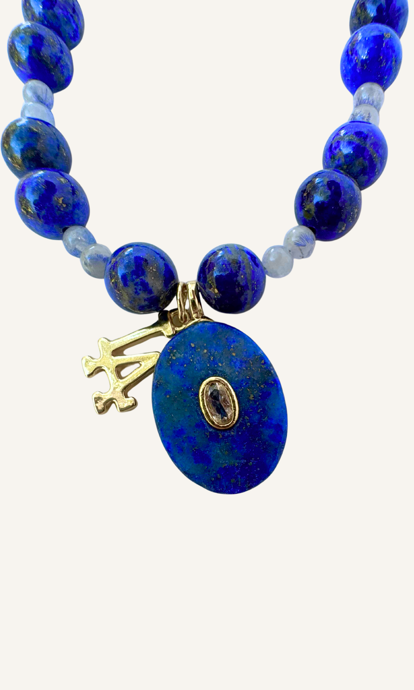 LA Dodgers inspired Lapis and Dumortiarite in Quartz necklace with Lapis and LA charms and a magnetic clasp. All metal is gold filled