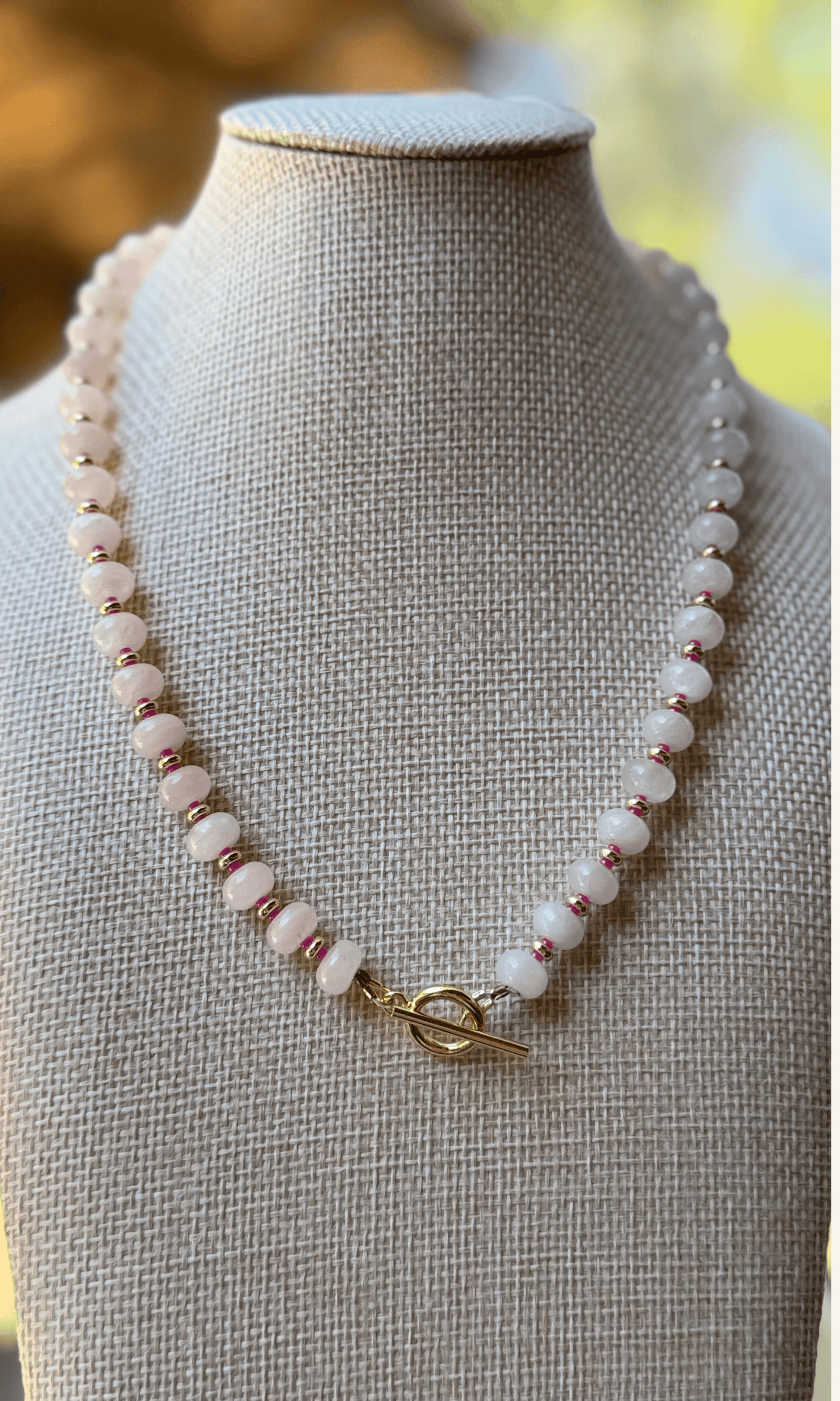 Light pink Rose Quartz necklace with gold filled findings, spacers, and toggle closure