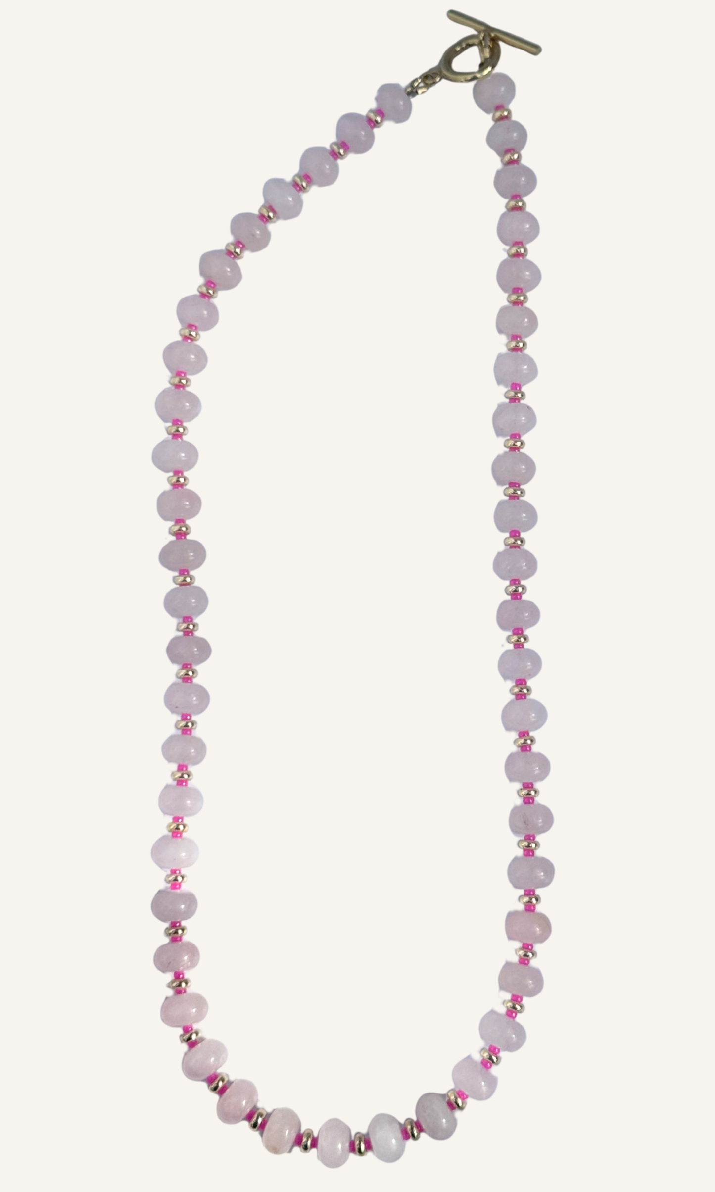 Light pink Rose Quartz necklace with gold filled findings, spacers, and toggle closure