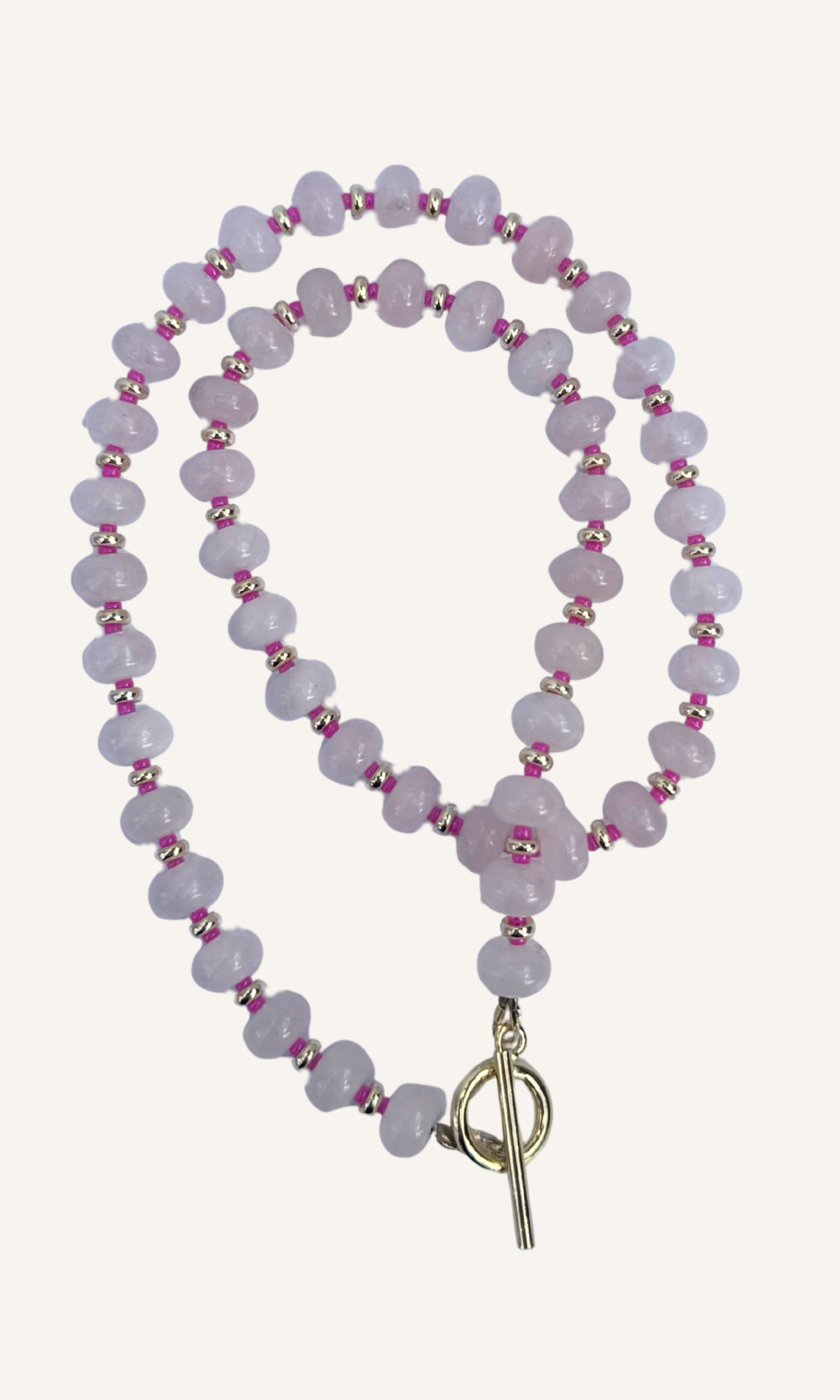 Light pink Rose Quartz necklace with gold filled findings, spacers, and toggle closure