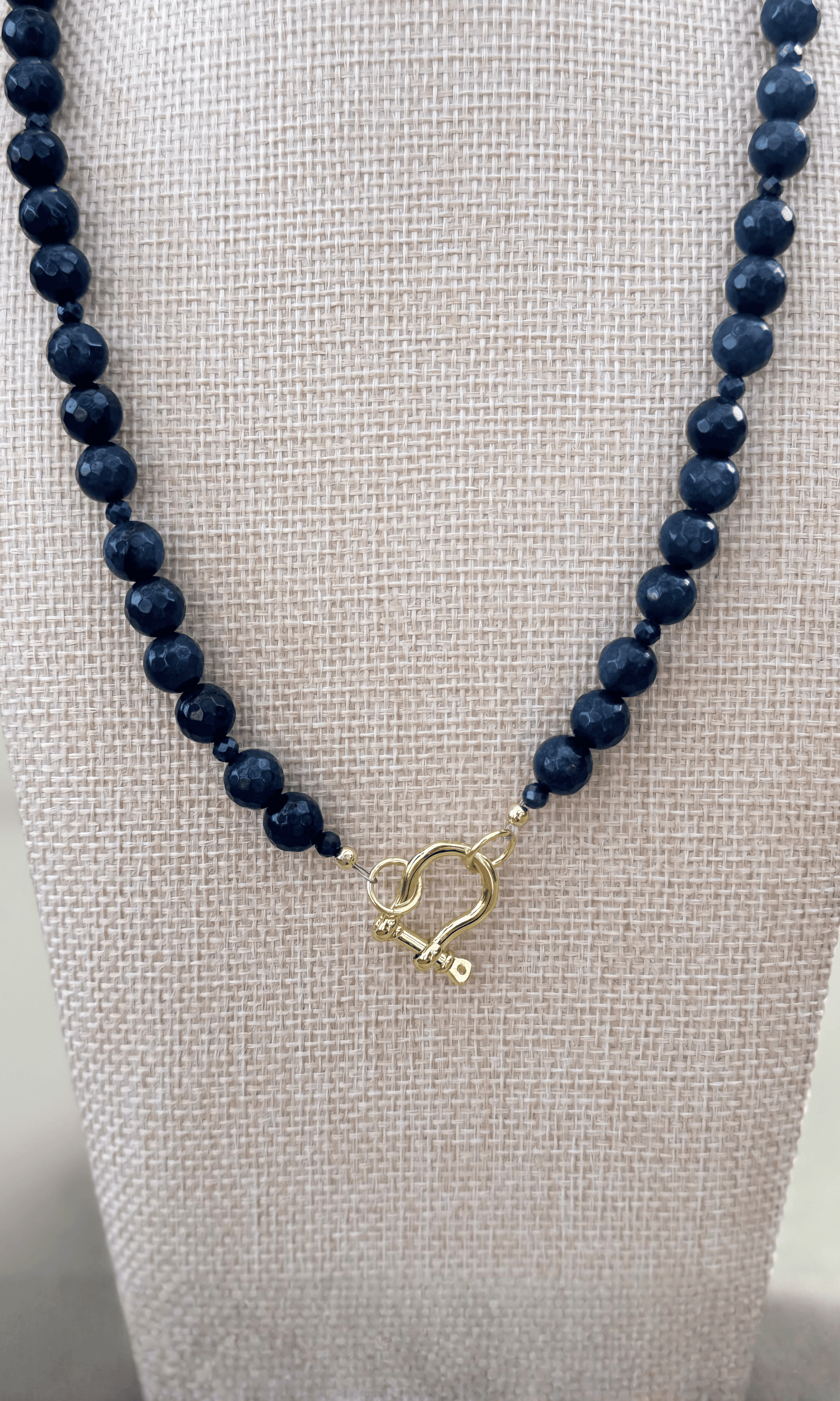 Midnight Jade and Blue Sapphire necklace with gold filled hardware including a horsebit connector and magnetic closure