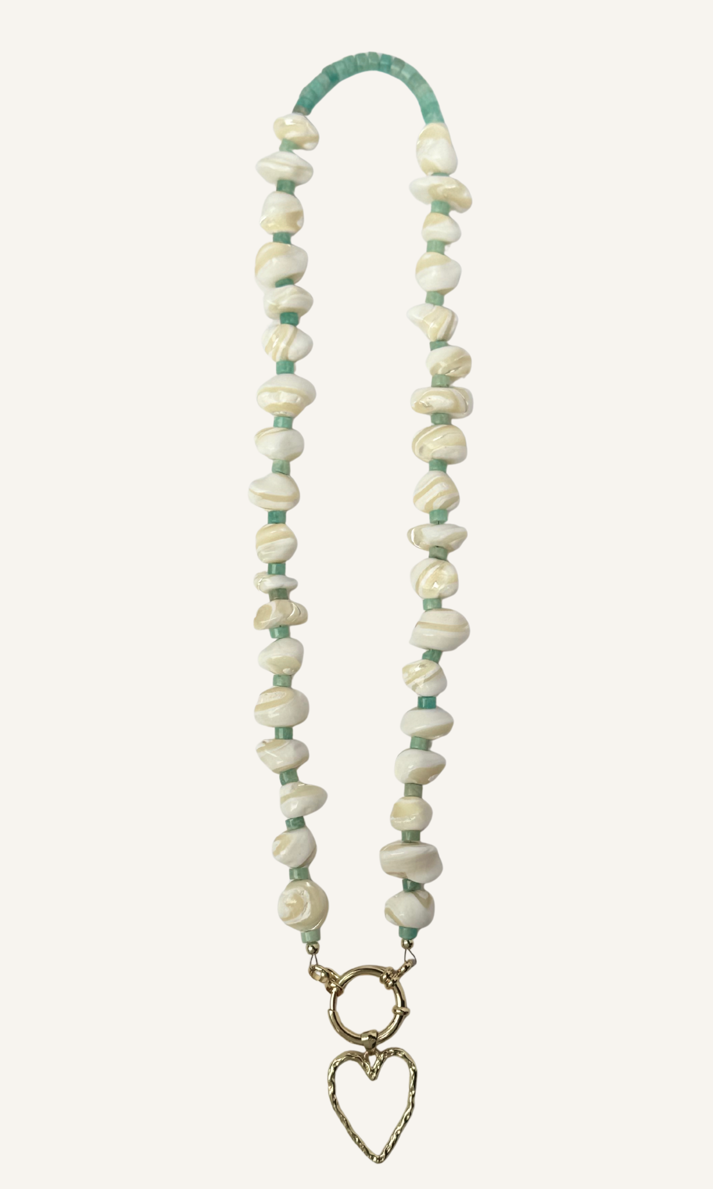 Mother of Pearl and Amazonite necklace with hammered hollow heart charm, gold filled findings, and a sailor clasp