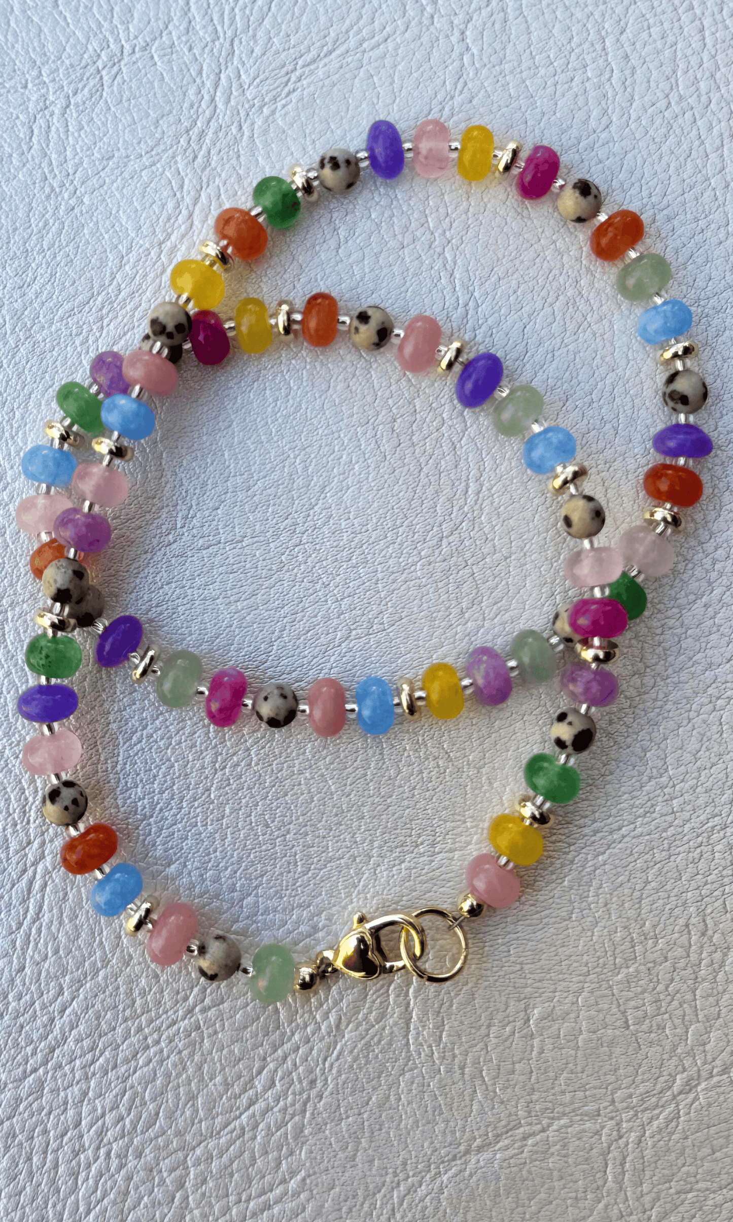 Multi-color Jade, Dalmatian Jasper, and gold filled spacers and a gold filled lobster clasp