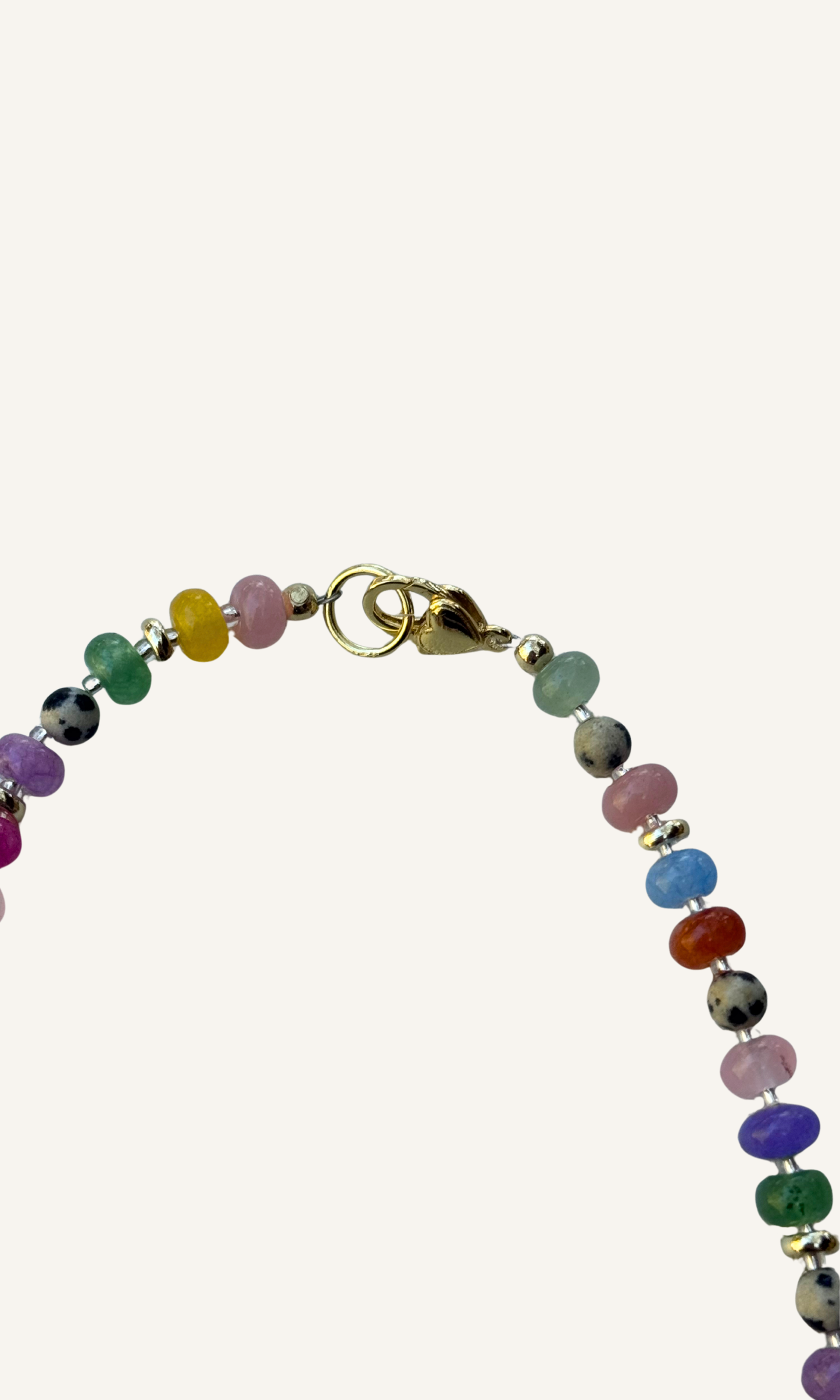 Multi-color Jade, Dalmatian Jasper, and gold filled spacers and a gold filled lobster clasp