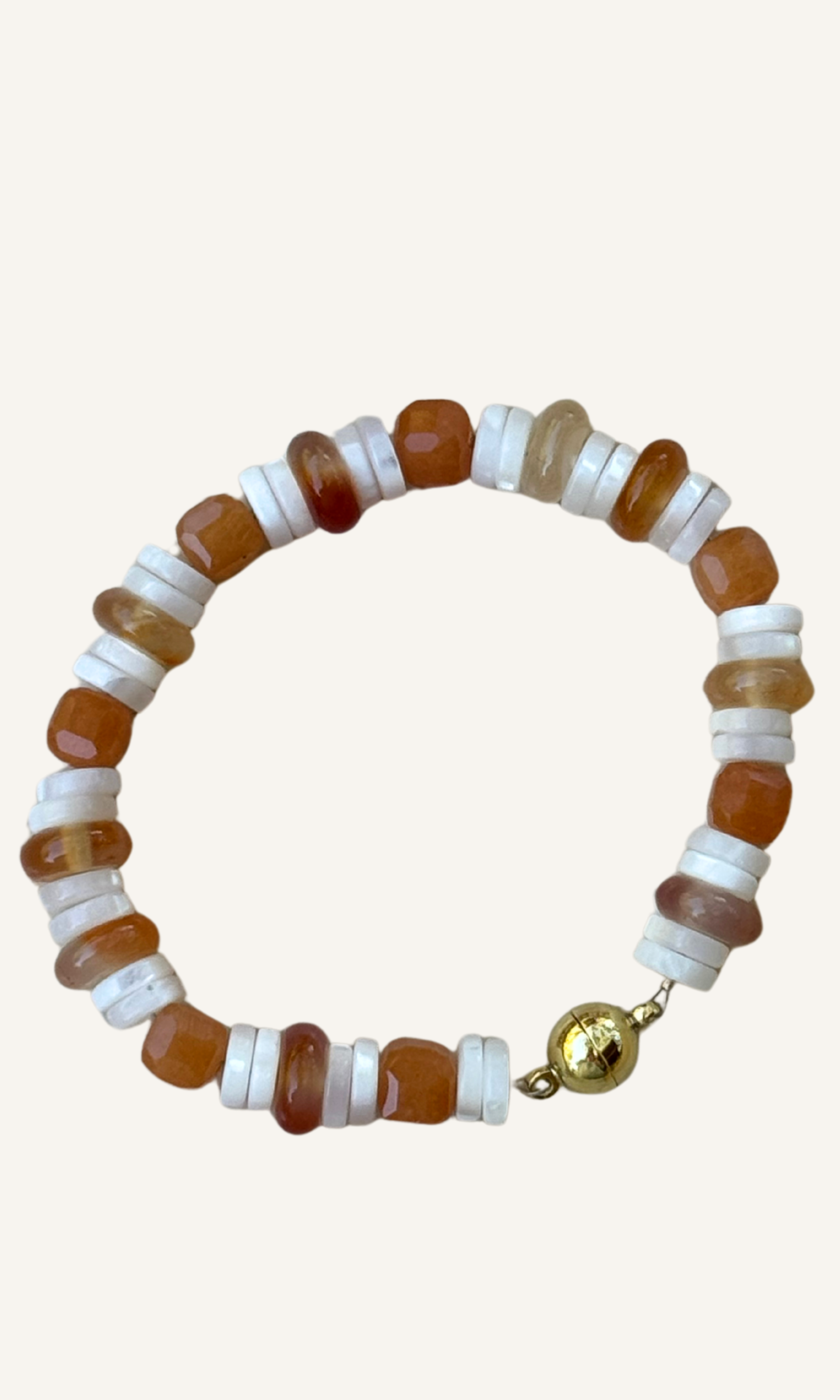 Orange Adventurine, Carnelian, and Mother of Pearl bracelet with gold filled findings and a magnetic clasp