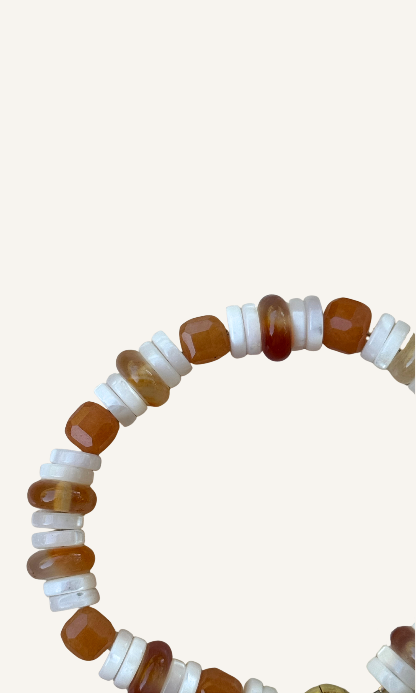 Orange Adventurine, Carnelian, and Mother of Pearl bracelet with gold filled findings and a magnetic clasp