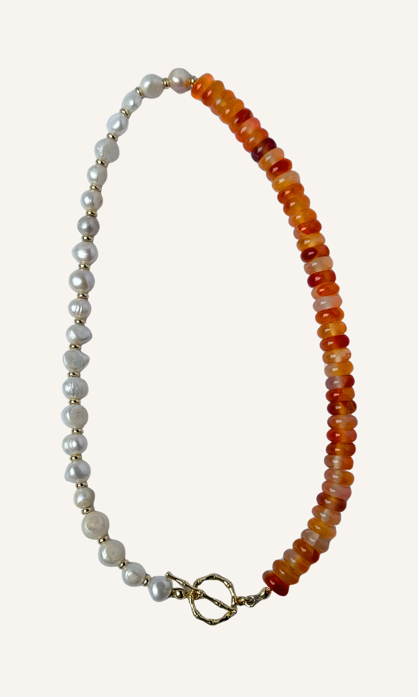 Orange Carnelian and Freshwater Pearl necklace with gold filled findings and a toggle closure