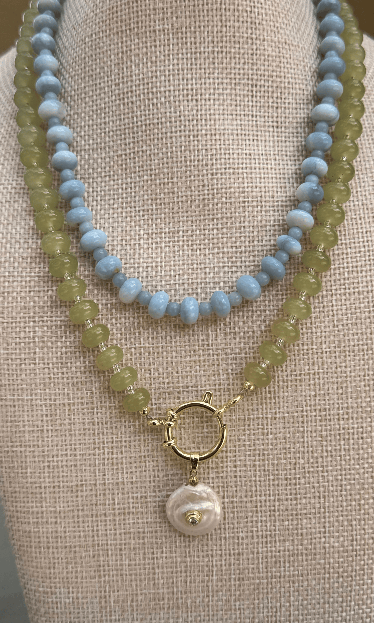Light green Peridot necklace with a Freshwater Pearl and cz pendant and a gold filled sailor clasp paired with a blue opal and angelite gemstone necklace with a gold filled clasp