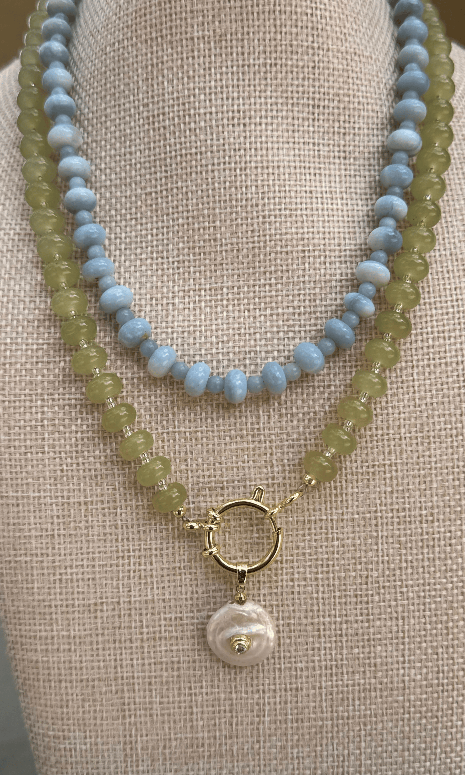 Light green Peridot necklace with a Freshwater Pearl and cz pendant and a gold filled sailor clasp paired with a blue opal and angelite gemstone necklace with a gold filled clasp