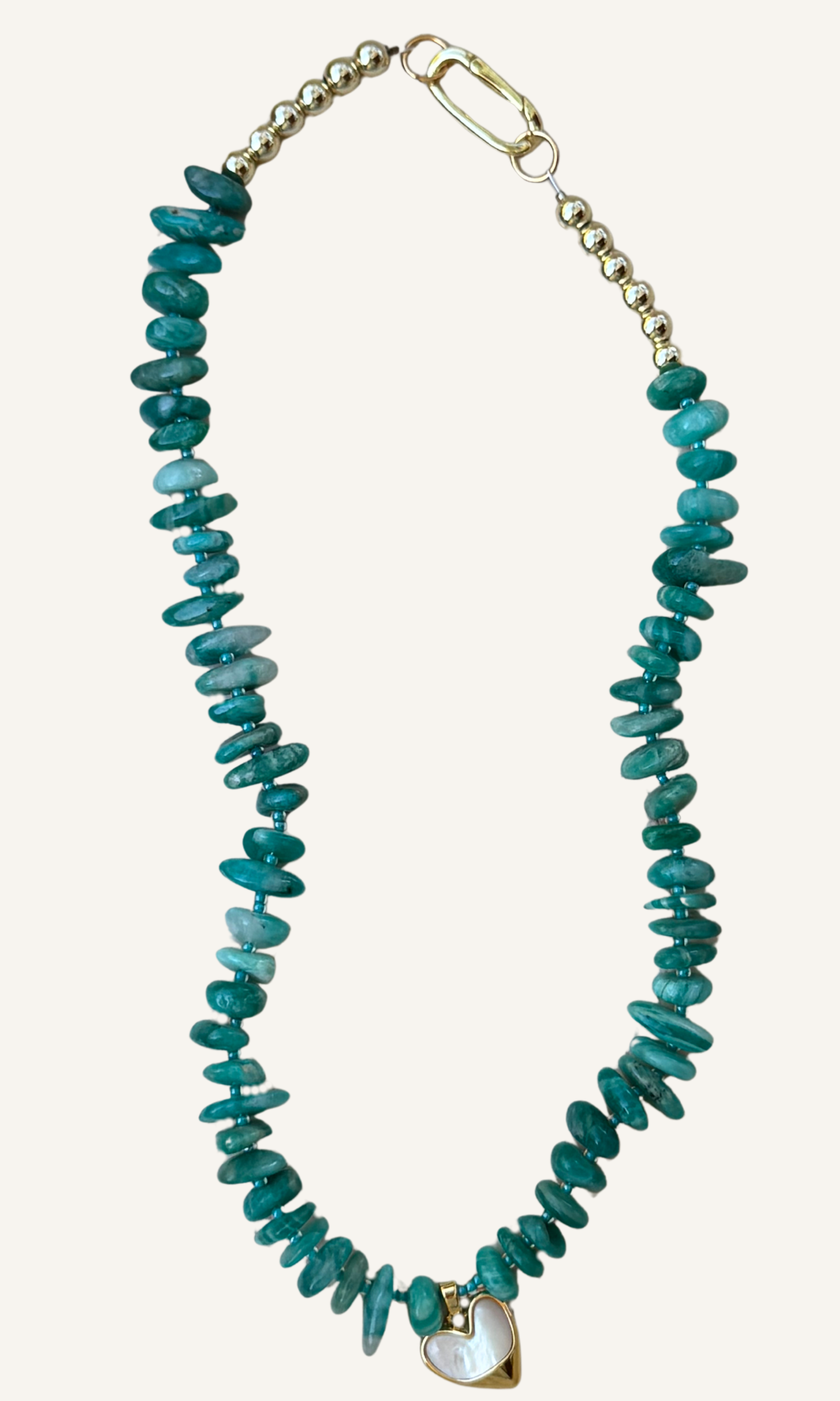Peruvian Amazonite necklace in a gorgeous shade of turquoise with Mother of Pearl heart charm, gold filled findings, and push gate clasp