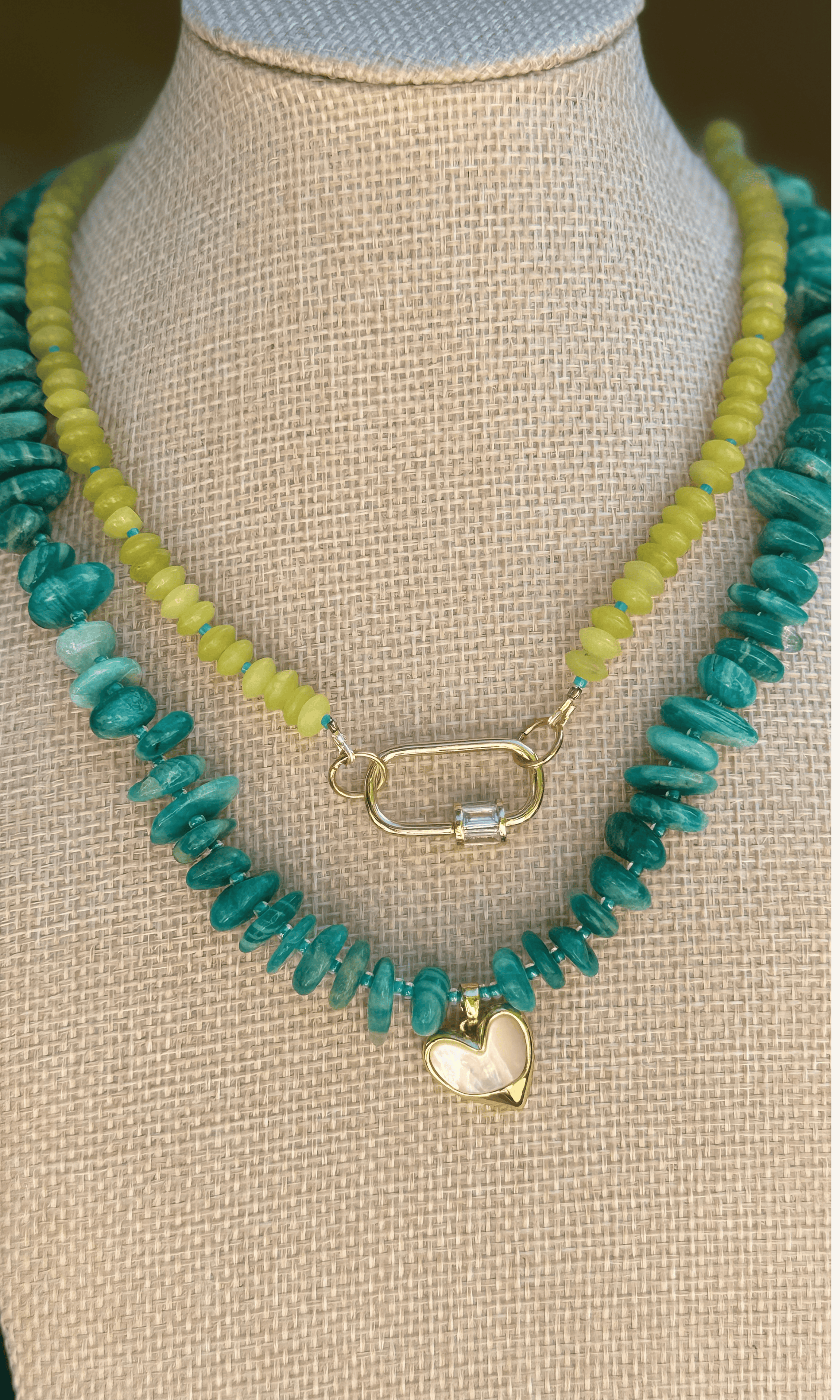 Peruvian Amazonite necklace in a gorgeous shade of turquoise with Mother of Pearl heart charm, gold filled findings, and push gate clasp and lemon jade necklace with blue spacers and gold filled caribiner 