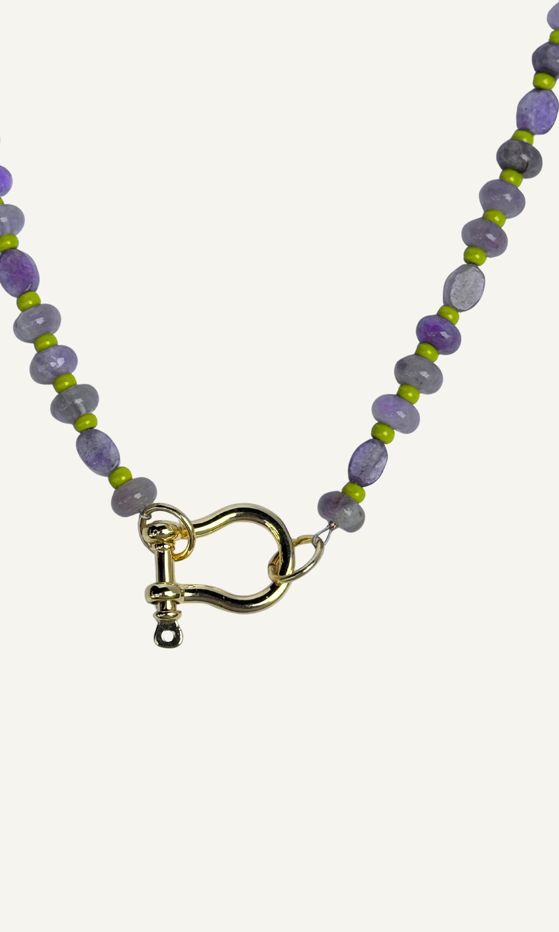 Purple Amethyst and Lepidolite necklace with green spacer beads, gold filled findings, and a horsebit carabiner.