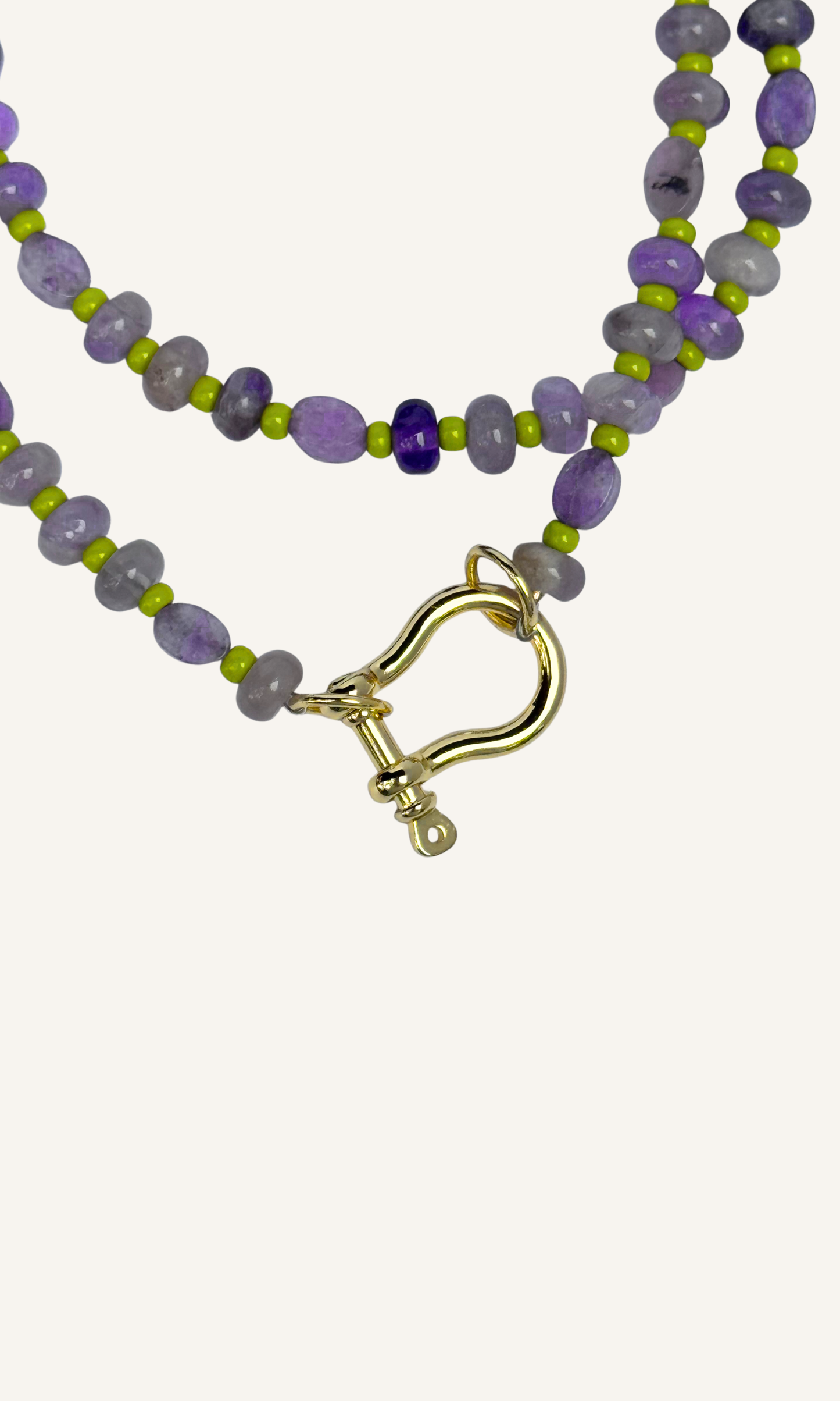 Purple Amethyst and Lepidolite necklace with green spacer beads, gold filled findings, and a horsebit carabiner.