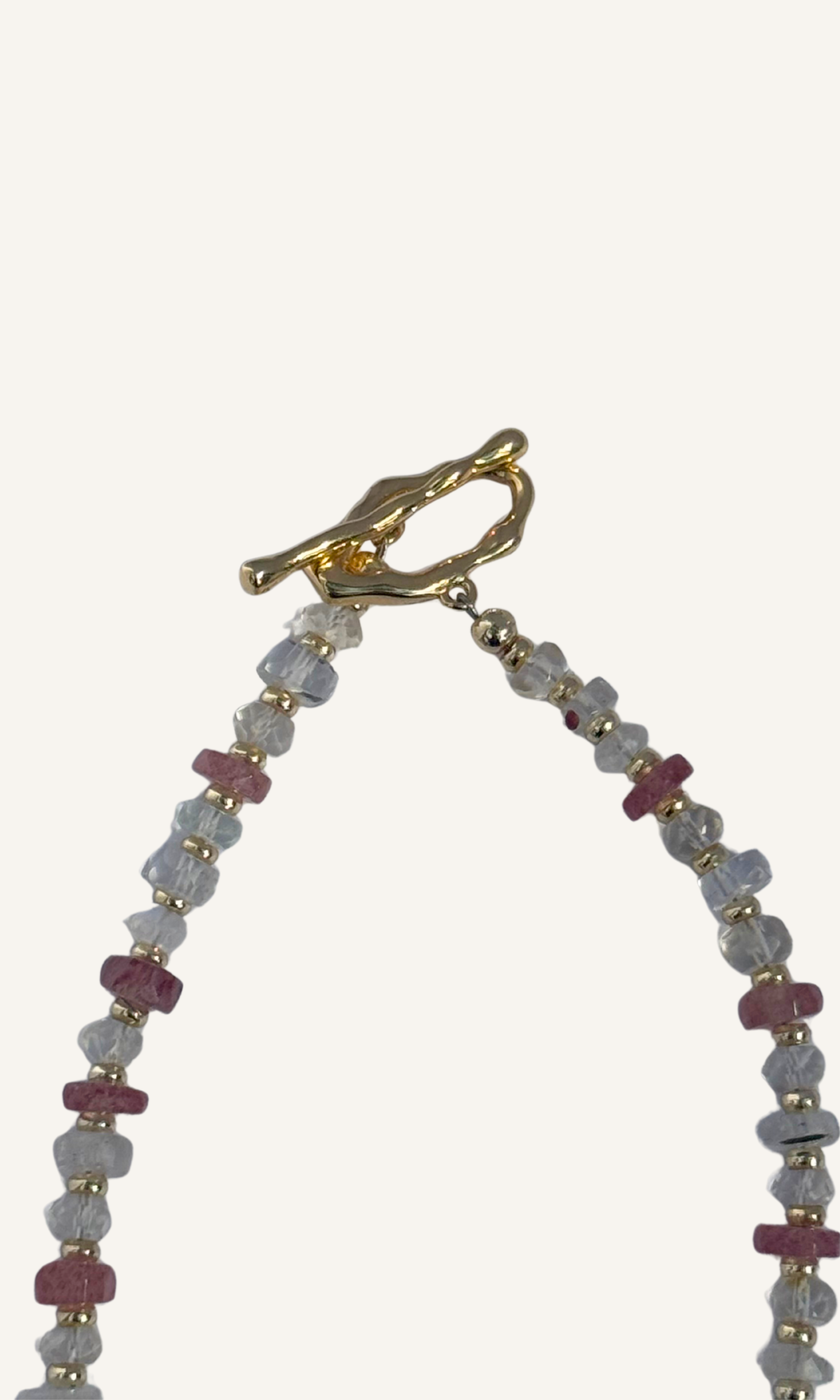 Strawberry Quartz and Rainbow Moonstone necklace with a gold filled toggle clasp and Strawberry Quartz pendant