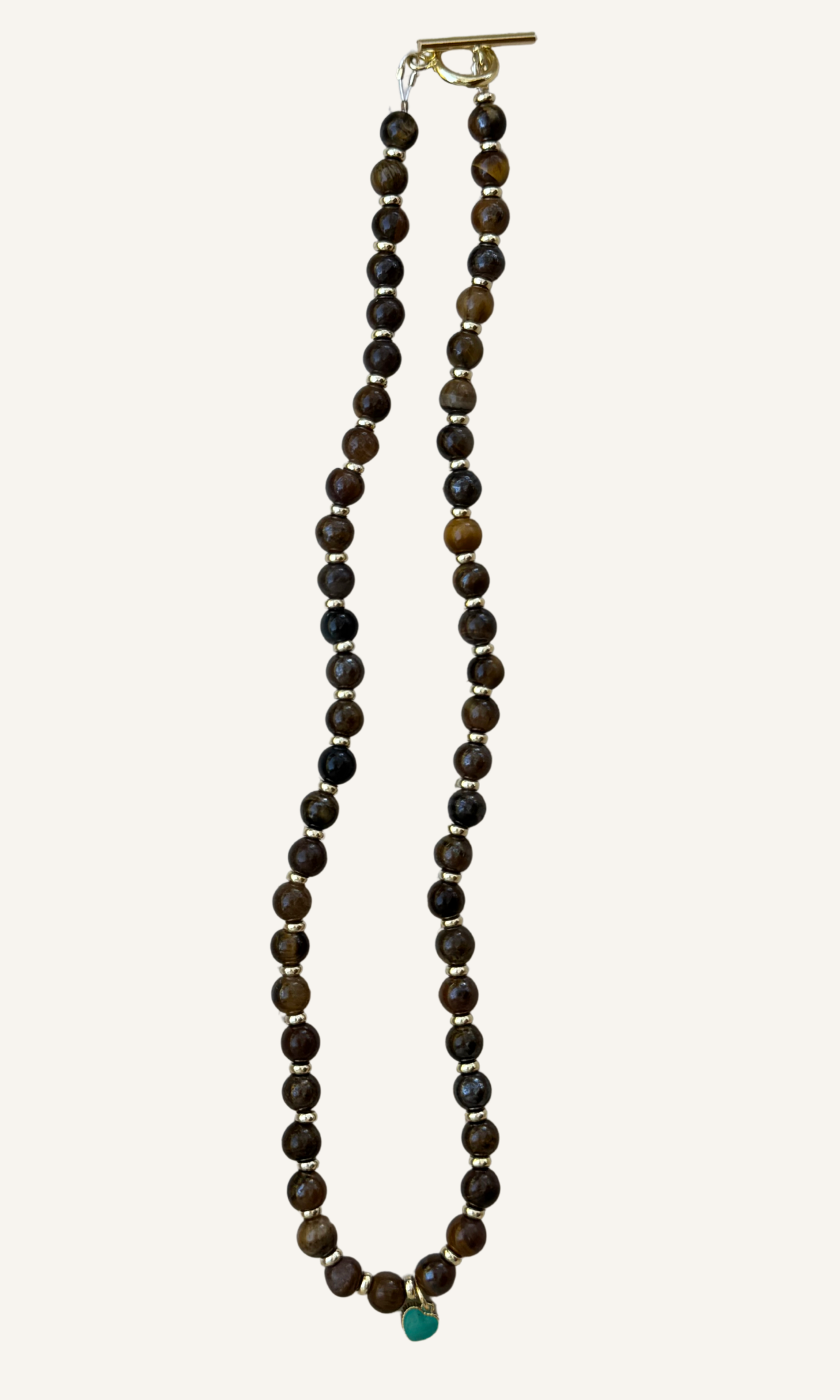 Tigers Eye necklace with dainty gold filled and turquoise colored enamel heart charm and a toggle closure