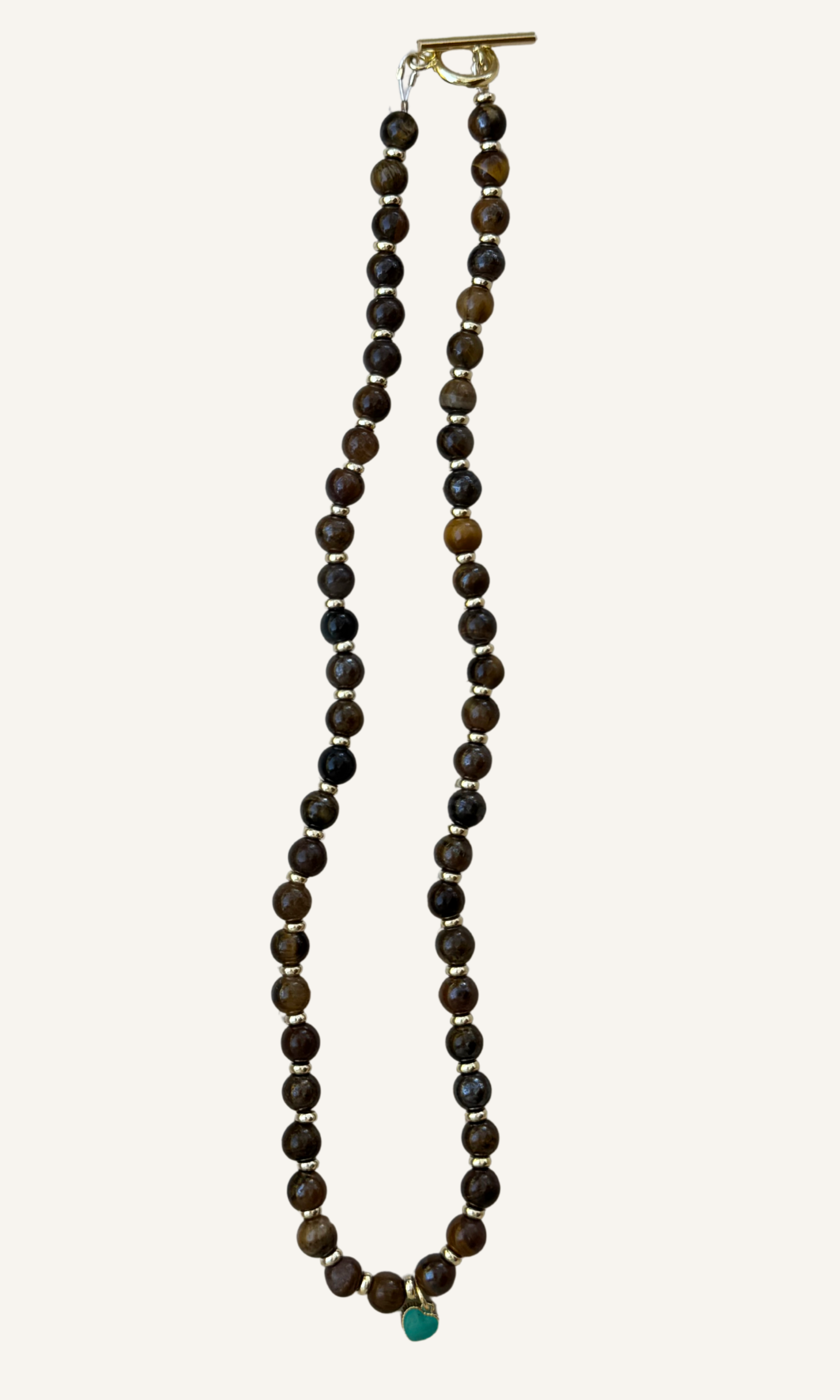 Tigers Eye necklace with dainty gold filled and turquoise colored enamel heart charm and a toggle closure
