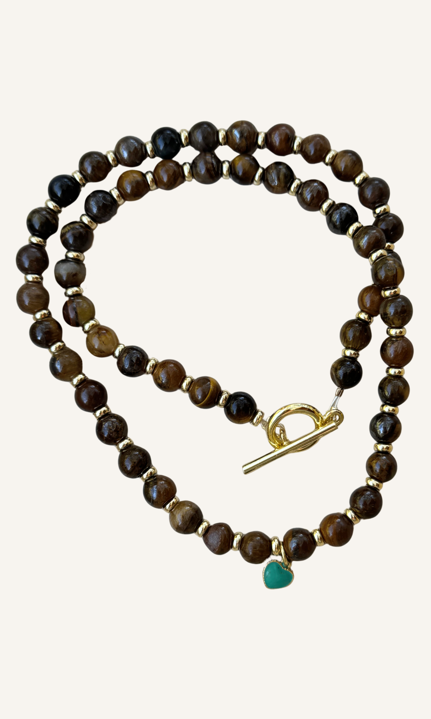 Tigers Eye necklace with dainty gold filled and turquoise colored enamel heart charm and a toggle closure
