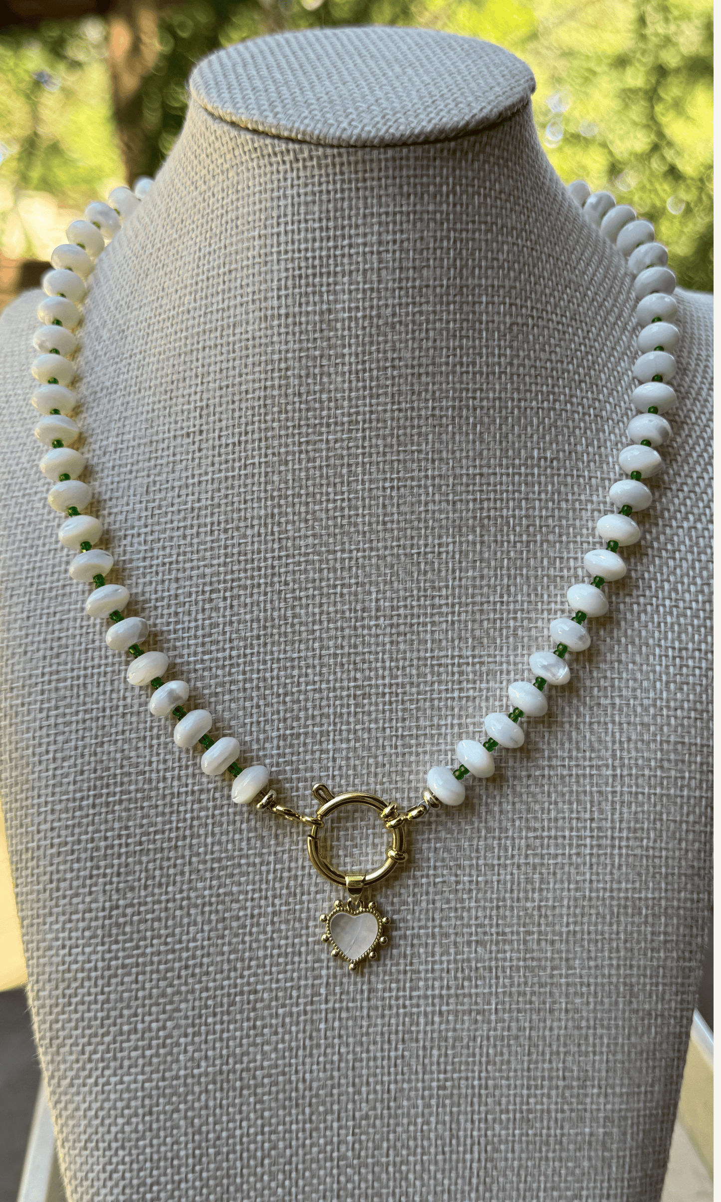 White Mother of Pearl candy-style necklace with custom color spacer beads, Mother of Pearl heart charm, gold filled findings, and sailor clasp