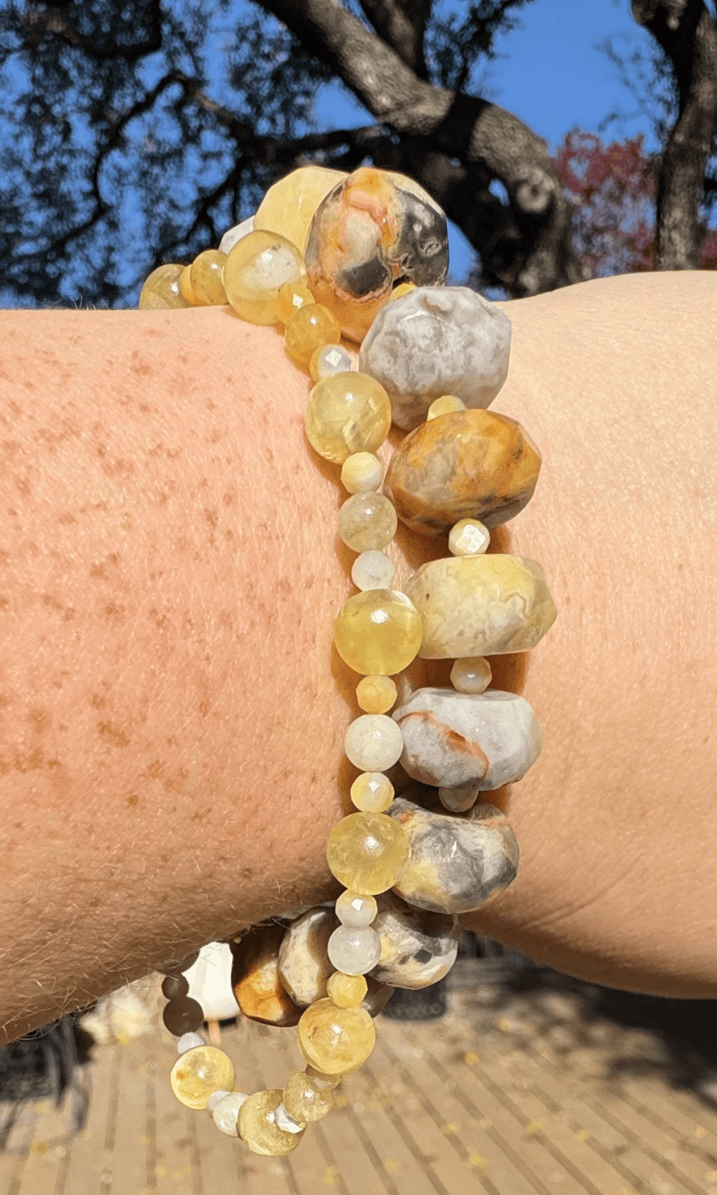 Multi-Gemstone bracelet with Golden Mother of Pearl, Yellow Aquamarine, Golden Lepidolite, and a gold filled magnetic clasp paired with a chunky yellow agate bracelet with golden mother of pearl spacers and a gold filled magnetic clasp