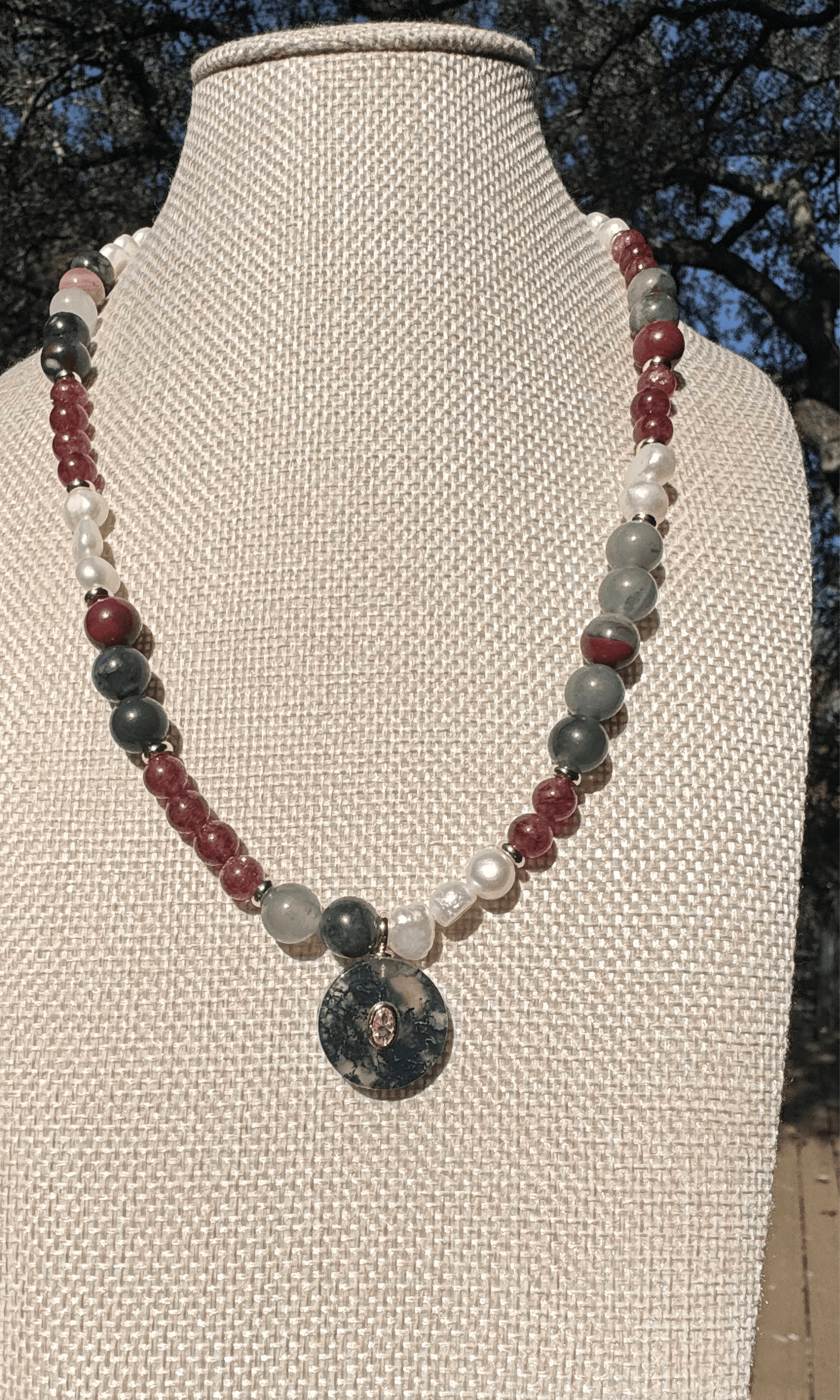 African Bloodstone, Strawberry Quartz, and Freshwater Pearl necklace with a Green Agate and Pink Cubic Zirconia charm, gold filled findings, and a toggle clasp