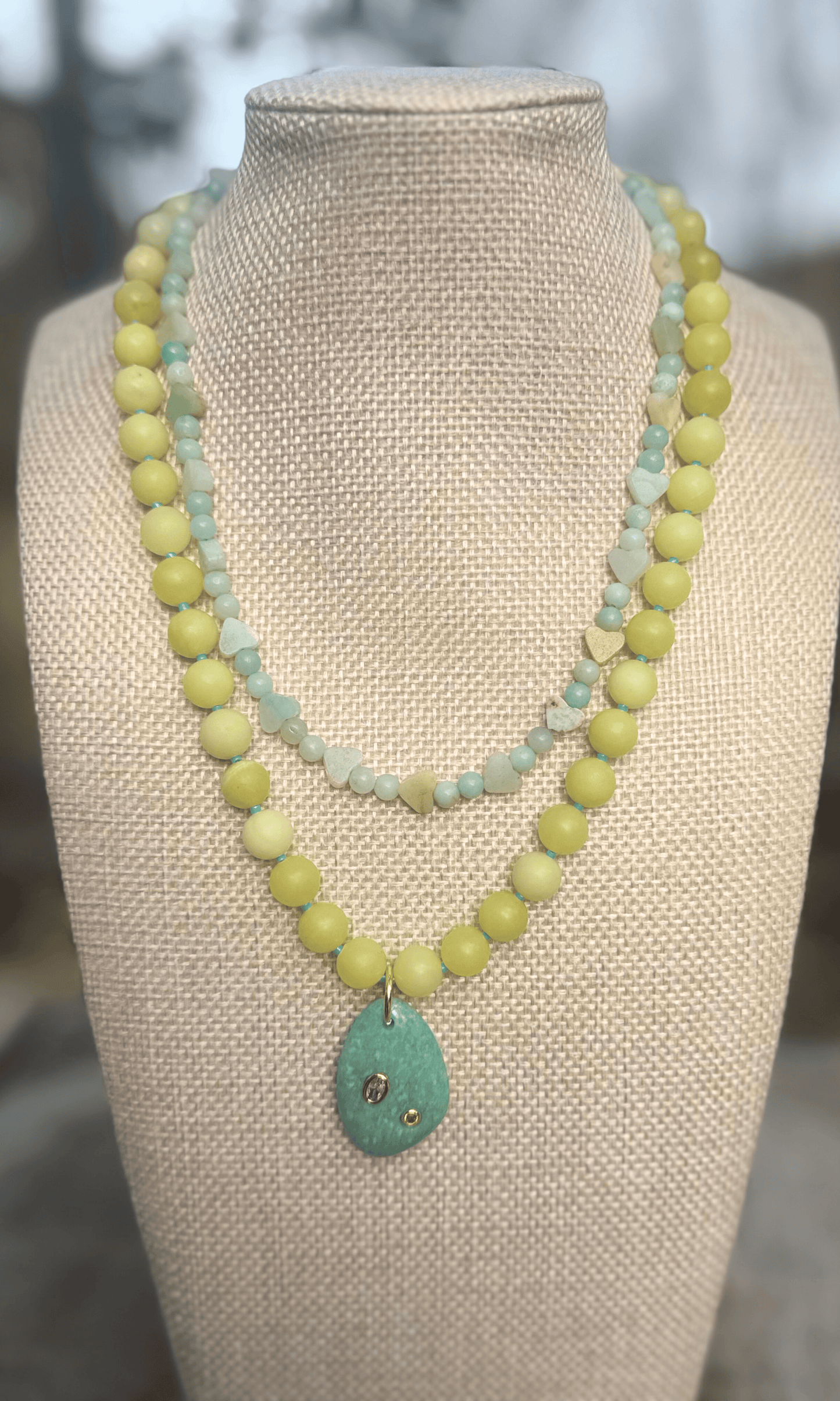 Amazonite heart necklace with a gold filled toggle clasp paired with lemon jade necklace with a vibrant amazonite pendant