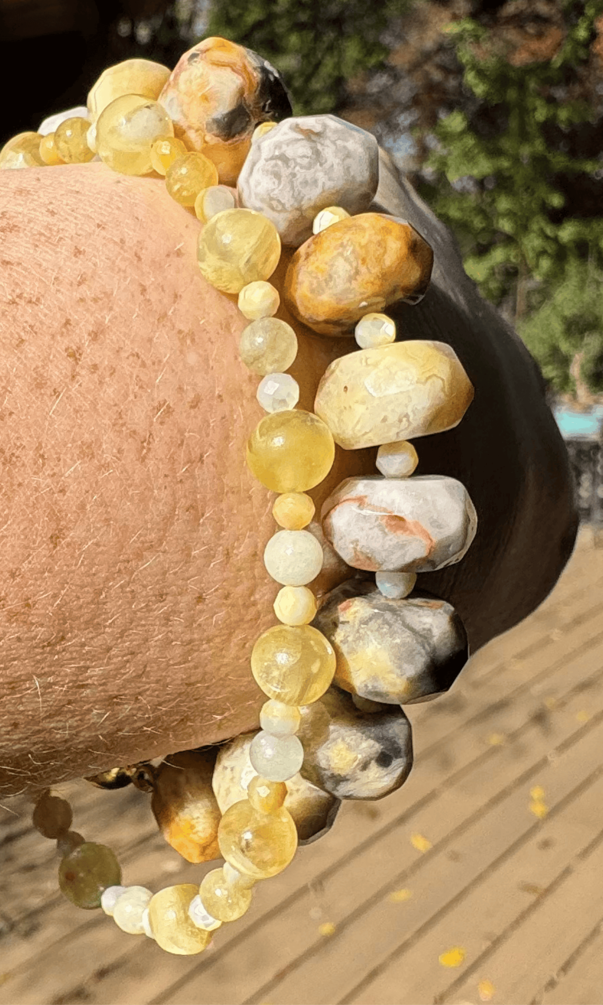 Multi-Gemstone bracelet with Golden Mother of Pearl, Yellow Aquamarine, Golden Lepidolite, and a gold filled magnetic clasp paired with a chunky yellow agate bracelet with golden mother of pearl spacers and a gold filled magnetic clasp