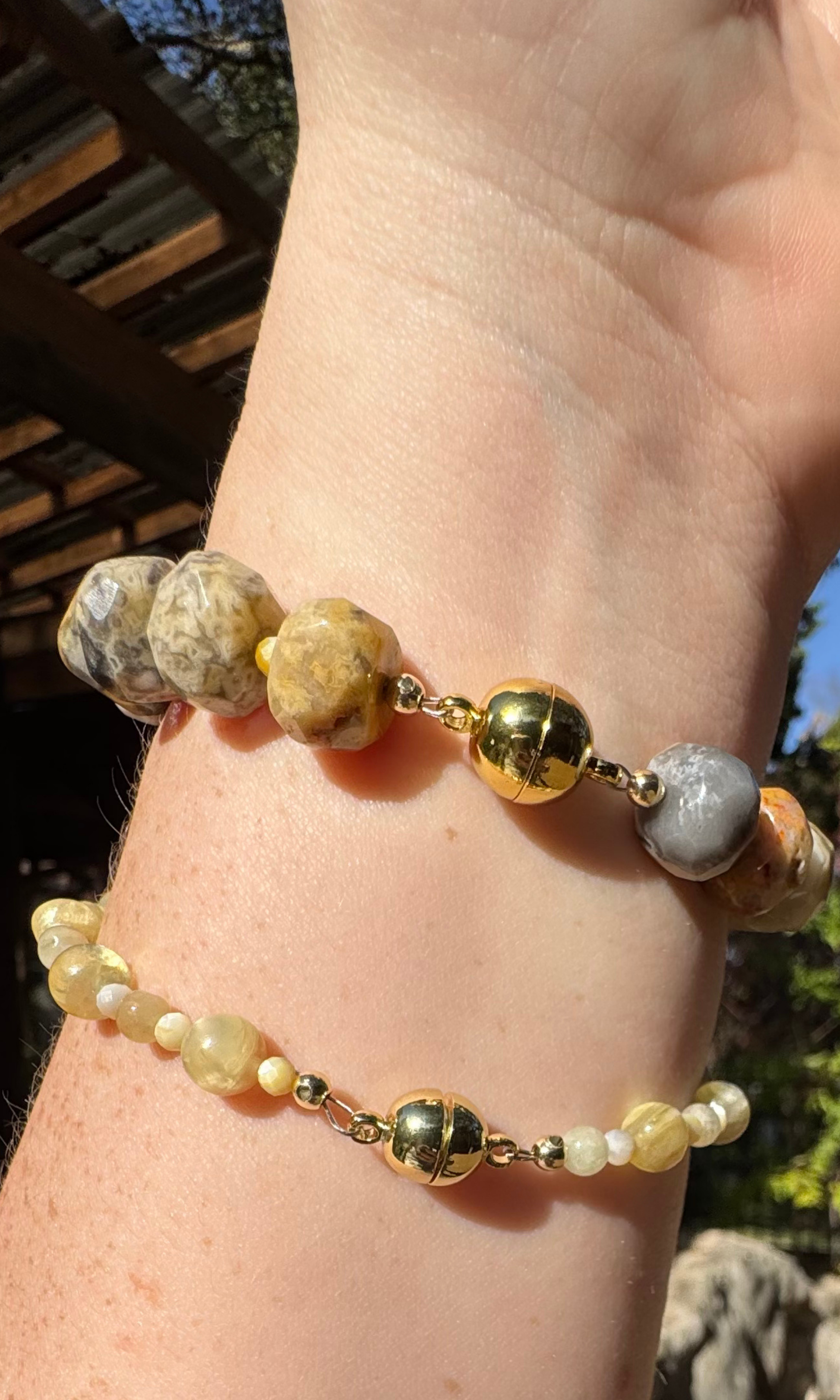 Multi-Gemstone bracelet with Golden Mother of Pearl, Yellow Aquamarine, Golden Lepidolite, and a gold filled magnetic clasp paired with a chunky yellow agate bracelet with golden mother of pearl spacers and a gold filled magnetic clasp